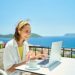 Two in five UK workers continue checking emails on holiday, with top earners working up to three days