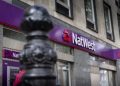 Natwest buys back £1bn in shares from Treasury as government stake drops to 11%