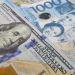 Peso slips to record-low P59 on hawkish Fed cut